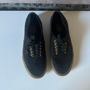 Vans Black Canvas Sneakers with Gold Eyelets and Gum Sole